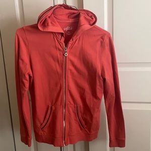 coral colored zip up hoodie by sports style and co